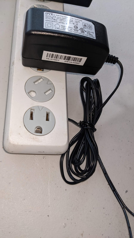 Power adapter and electrical outlet for water valve system